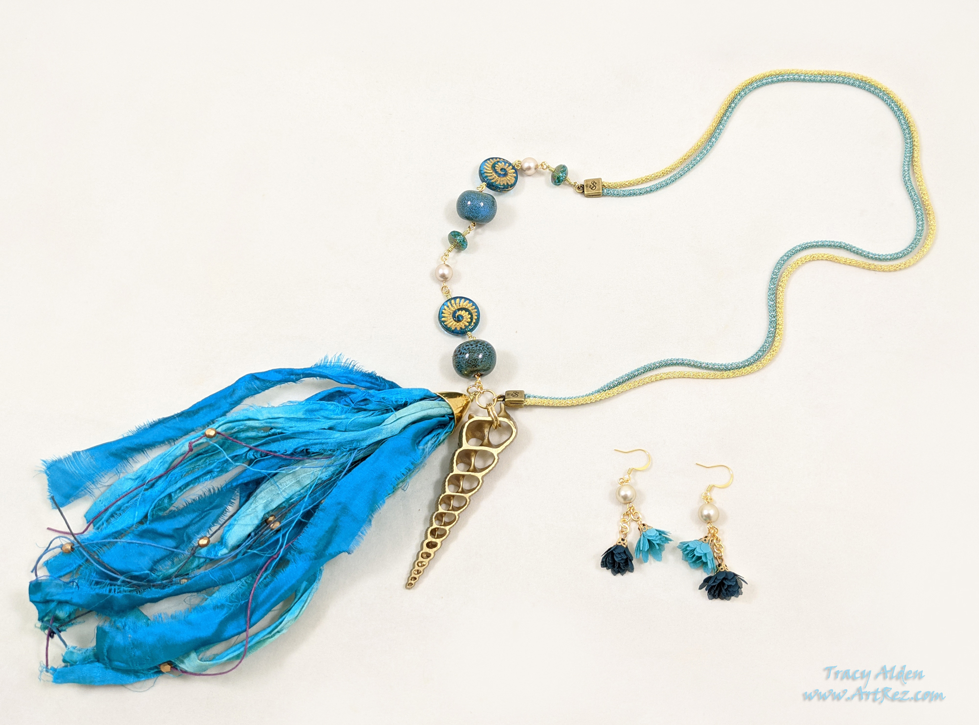 SilverSilk necklace and earring set in gold and teal tones