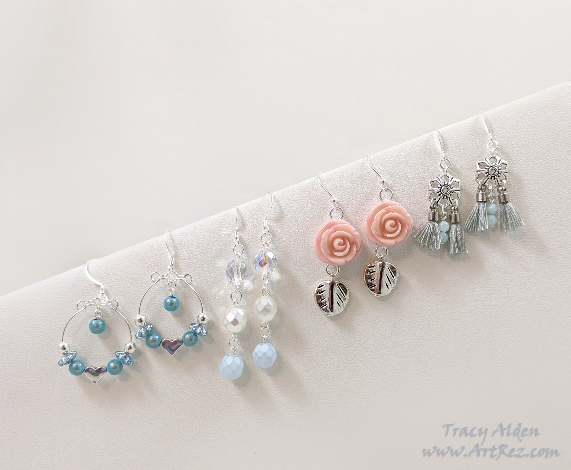 Earrings in pastel blue and pink using Jesse James Beads